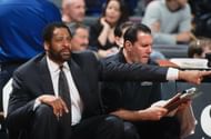 Don Chaney points down the court